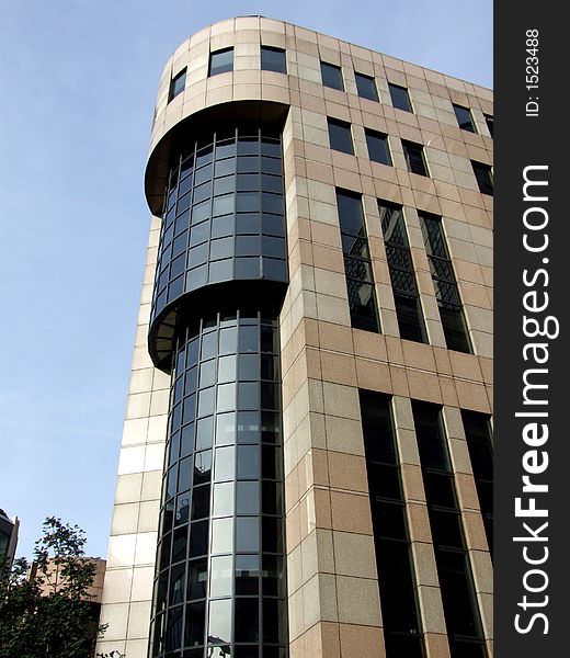 A modern glass office building in central London. A modern glass office building in central London.