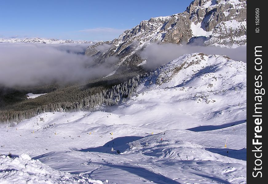 A white cover of snow in the mountains. A white cover of snow in the mountains