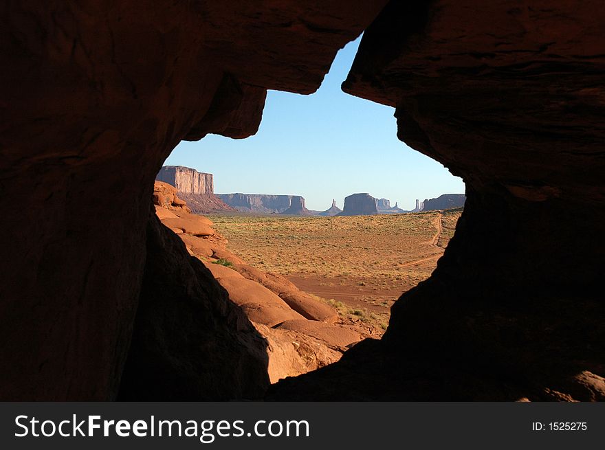 View of the Monument Valley though a leaf-shape window. Monument Valley Navajo tribal park, Arizona/Utah