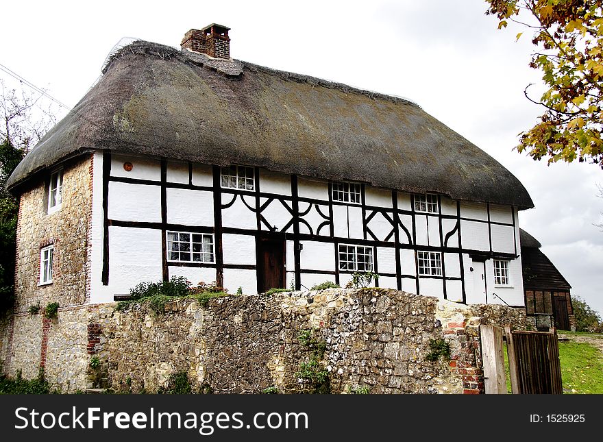Thatched Timber Framed Cottage in a Rural Village in England. Thatched Timber Framed Cottage in a Rural Village in England