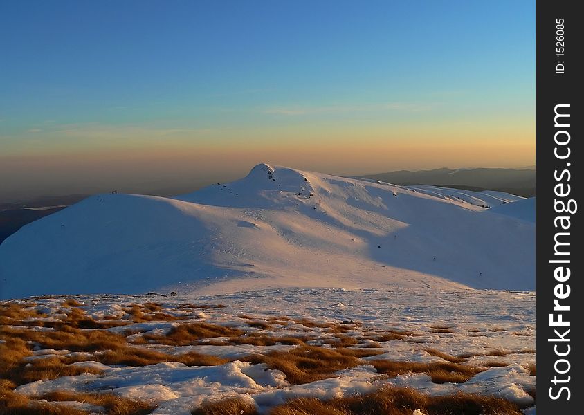 Mountain sunset in winter time III