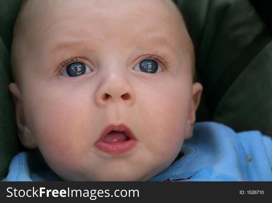 Close-up portrait of a cute baby boy. Close-up portrait of a cute baby boy