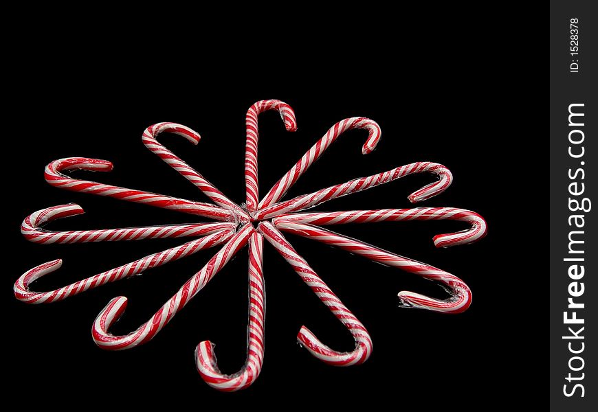 Candy cane spiral on a black background. Candy cane spiral on a black background.
