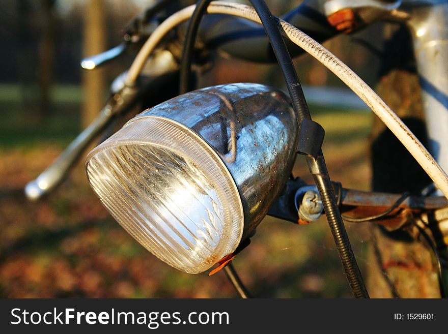 Corroded lamp on a very old bicycle. I wonder if it's still working . Corroded lamp on a very old bicycle. I wonder if it's still working ...