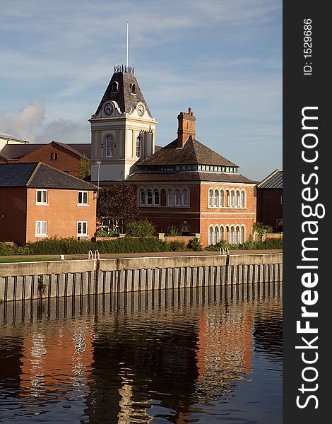 A clock tower reflection in the River Trent at Newark.