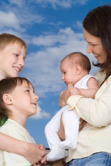 Young Mother With Three Children Stock Photography