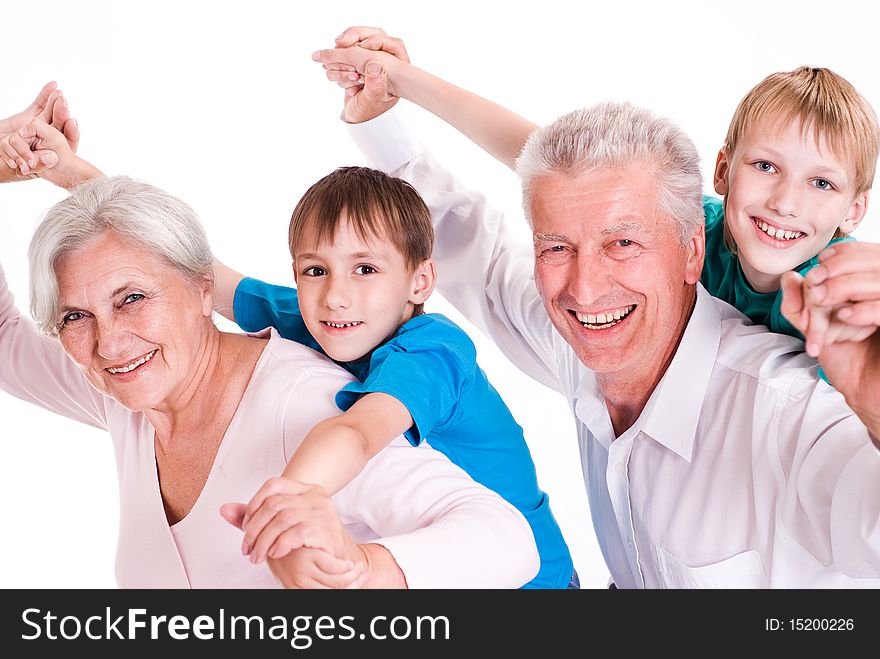 Happy Smiling Grandparents With Their Grandsons