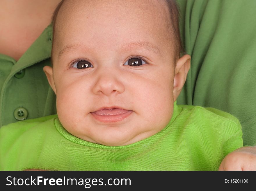 Newborn In The Arms Of His Father