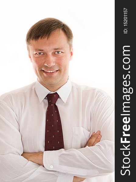 Portrait of a happy businessman on a white background