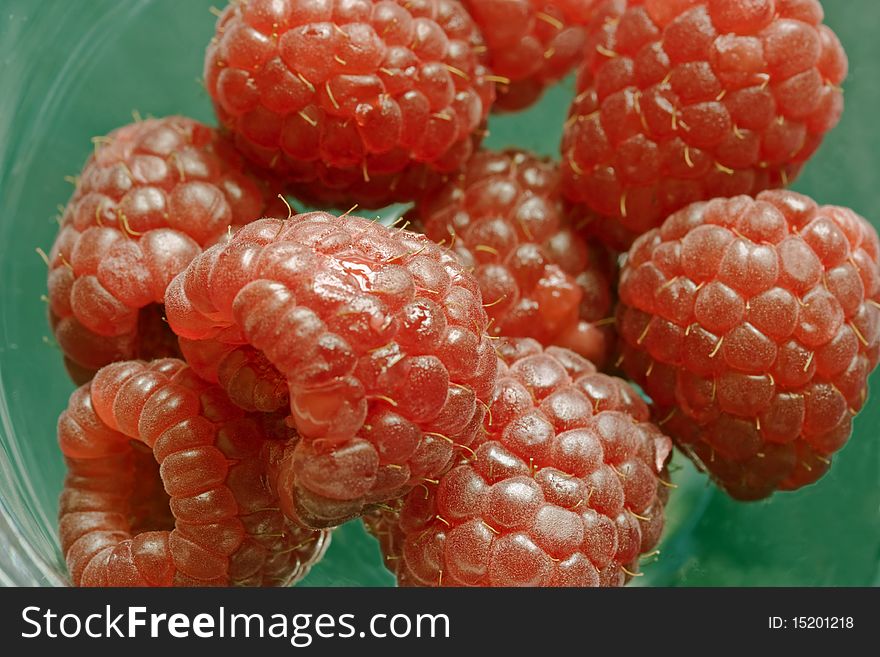 A background image of fresh raspberries