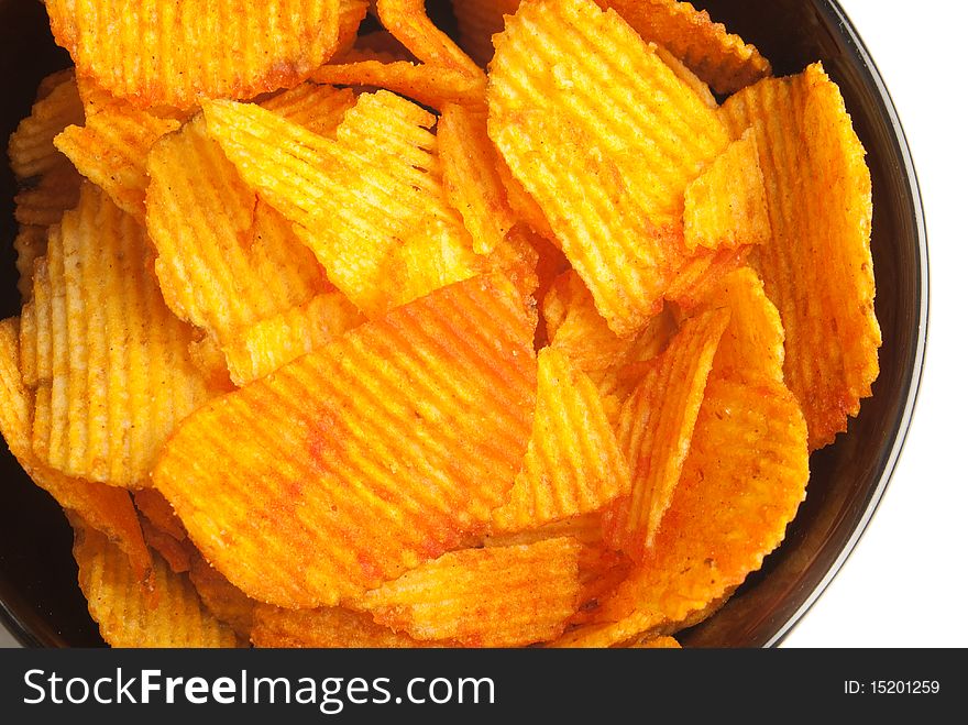 Crispy potato chips spiced with hot paprika