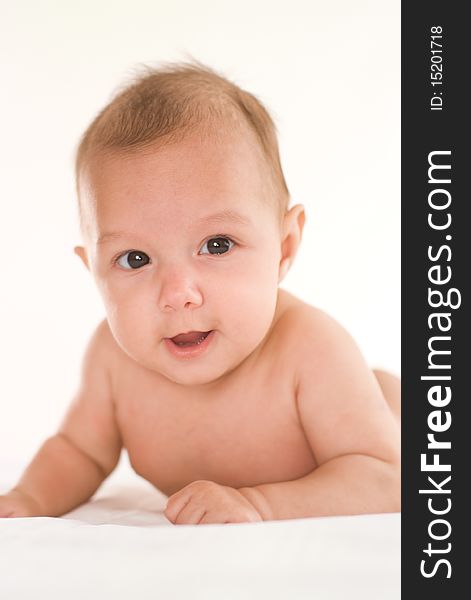 Portrait of a beautiful newborn on a white background