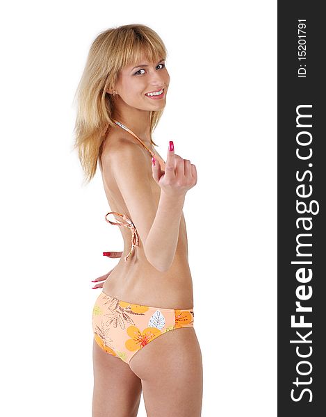 A young and attractive blond girl with a beautiful smile is wearing an orange swimsuit. The image is isolated on a white background. A young and attractive blond girl with a beautiful smile is wearing an orange swimsuit. The image is isolated on a white background.