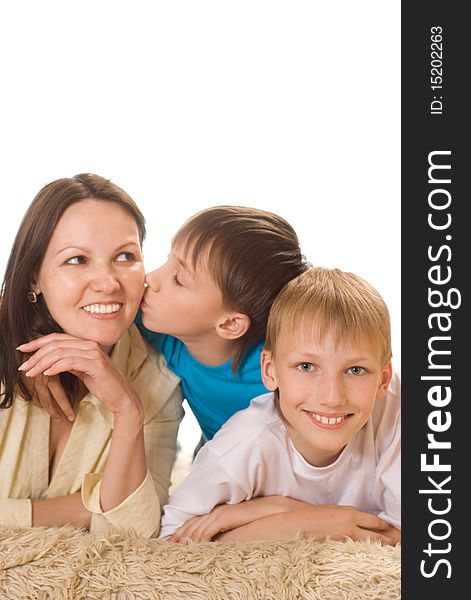 Happy mom and children on a white background