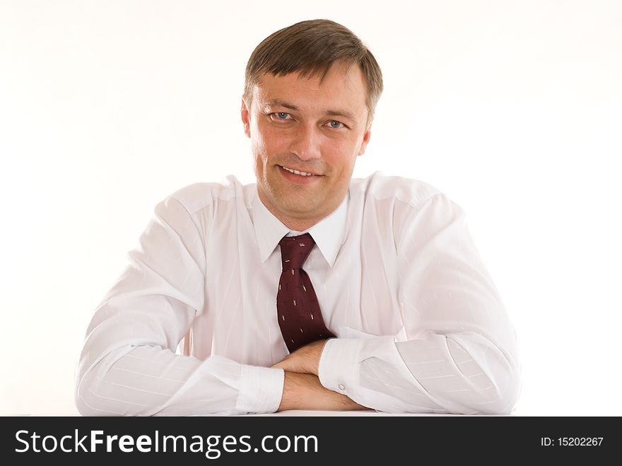 Happy businessman on a white background