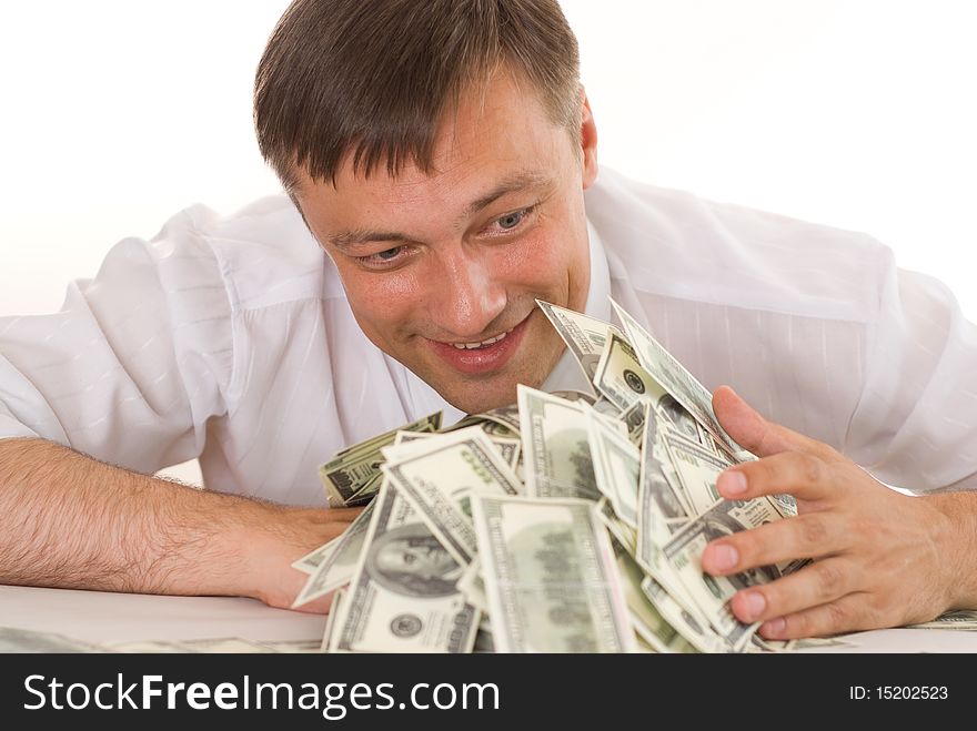 Young man holding money on white