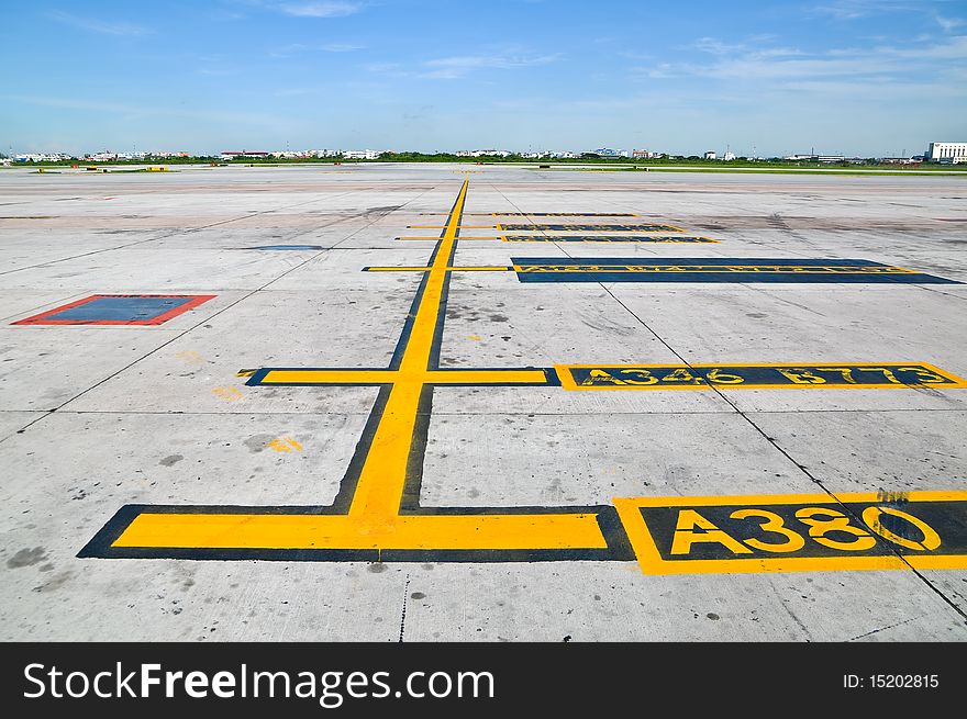 Yellow taxi line for parking at airport