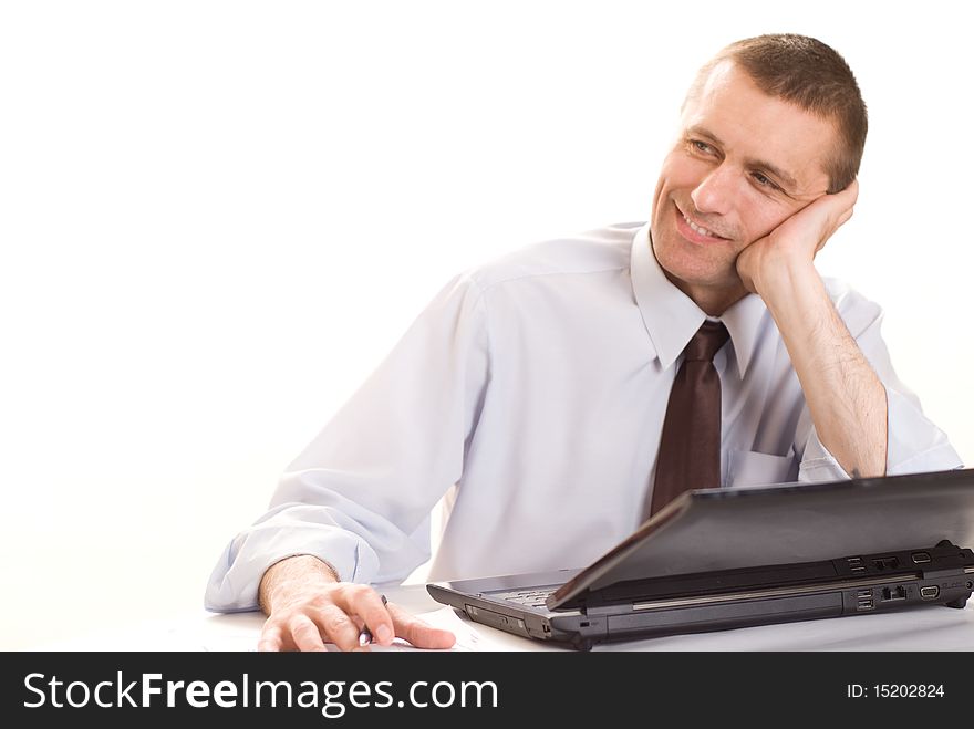 Businessman with laptop on white