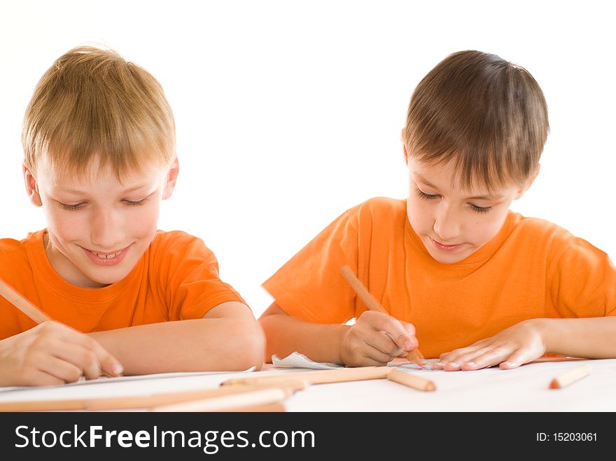 Two brothers paint on a white background