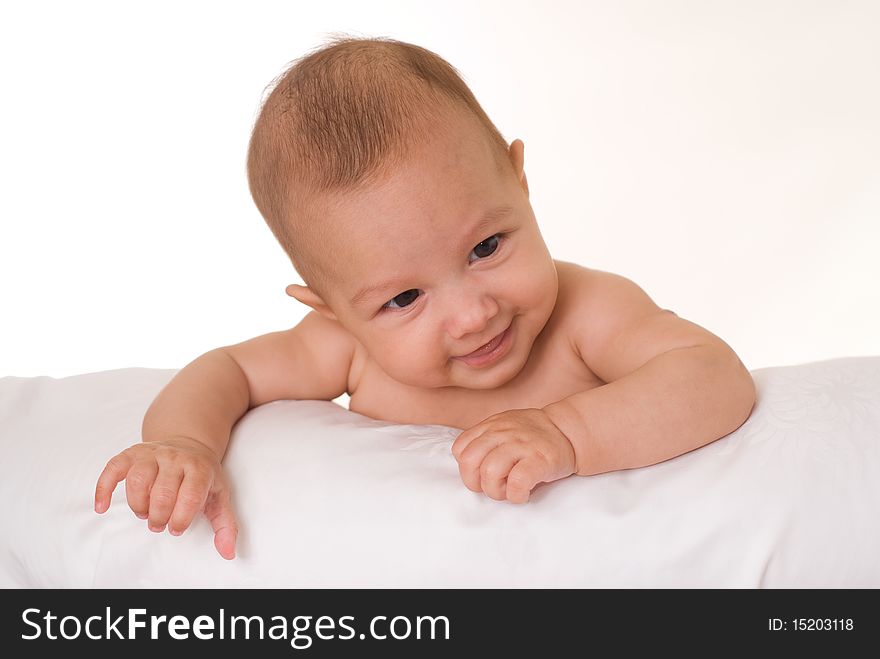 Portrait of a beautiful newborn baby on a white