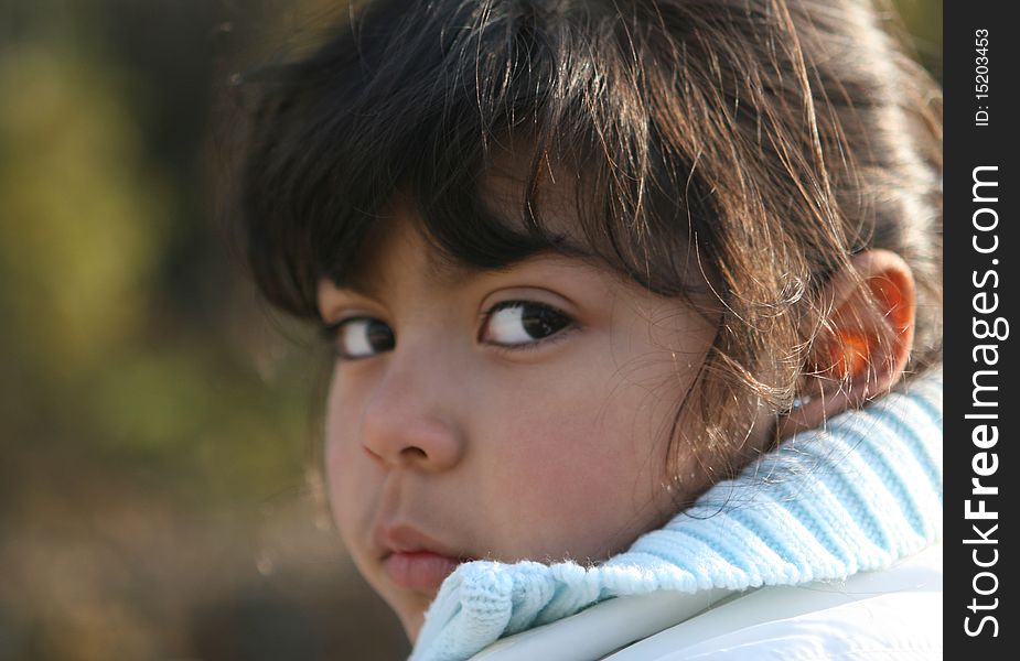 Little southamerican black hair girl looking camera. Little southamerican black hair girl looking camera