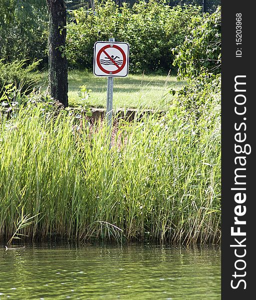 Warning sign in a lake