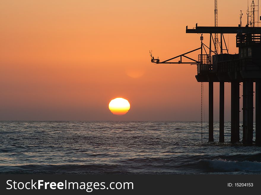 Sunset above Pacific Ocean with the Scripps Pier at La Jolla in the foreground. Sunset above Pacific Ocean with the Scripps Pier at La Jolla in the foreground