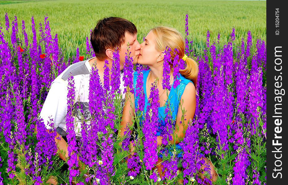 Loving couple in the meadow
