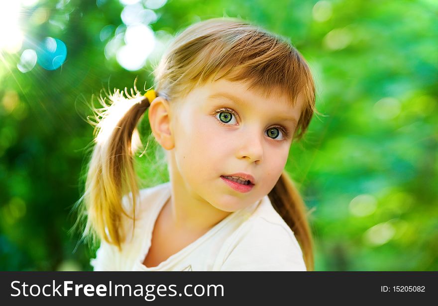 Liitle Girl On Green Background