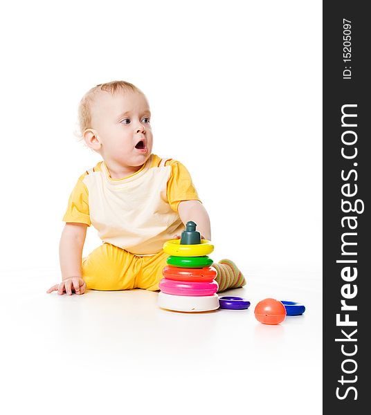 Little boy with a pyramid on white background