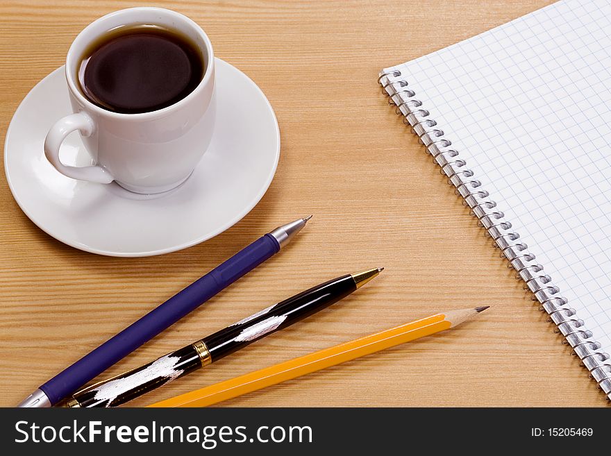 Cup of coffee at table. Cup of coffee at table