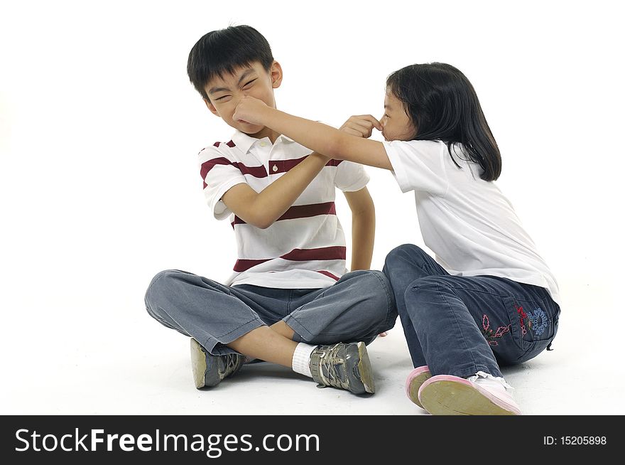 Brother and sister playing together,. Brother and sister playing together,