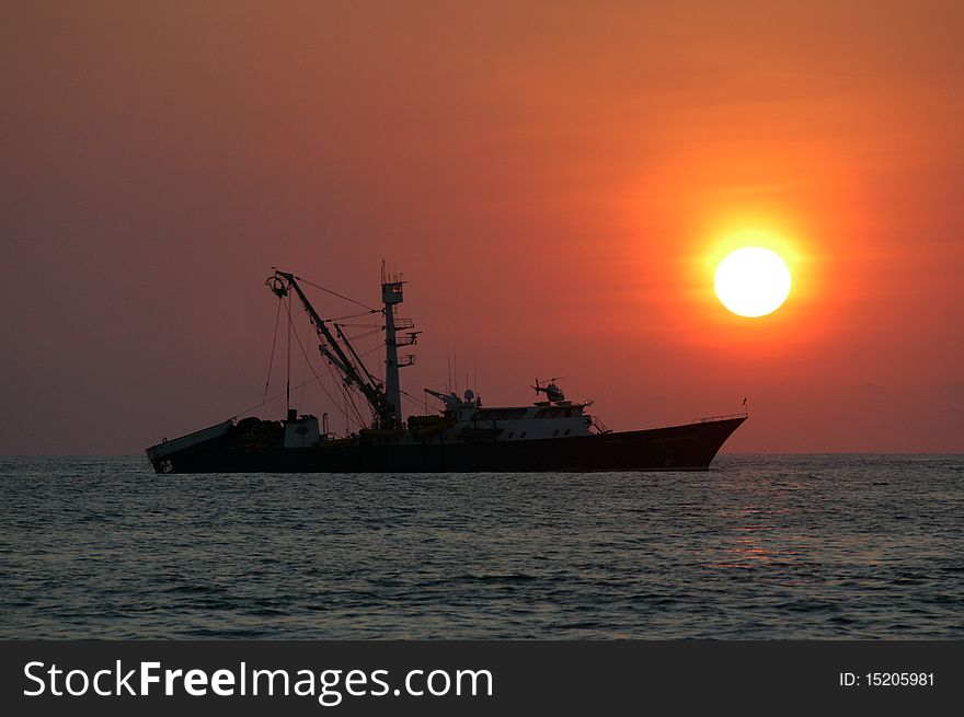 Boat on sea during sunset, Puerto Escondido, Mexico. Boat on sea during sunset, Puerto Escondido, Mexico