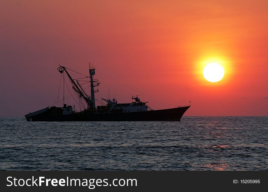 Boat on sea during sunset, Puerto Escondido, Mexico. Boat on sea during sunset, Puerto Escondido, Mexico