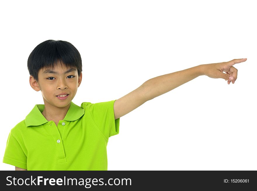 Asian boy pointing towards on white. Asian boy pointing towards on white