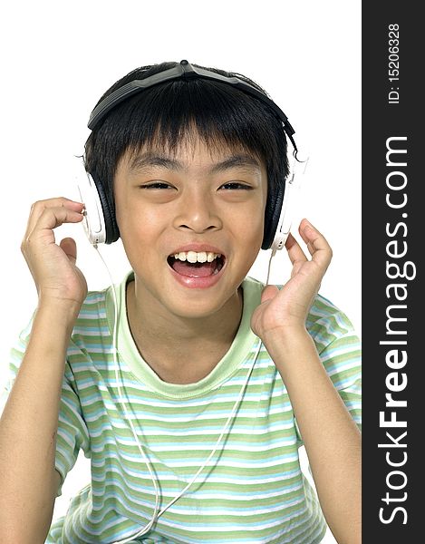 Boy listening to music with headphones. Boy listening to music with headphones