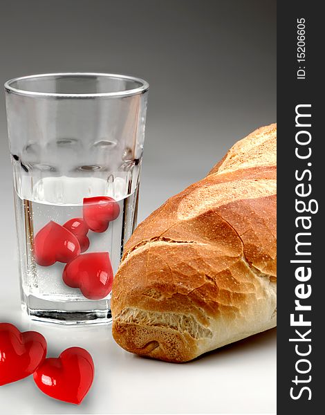 Water and bread with heart