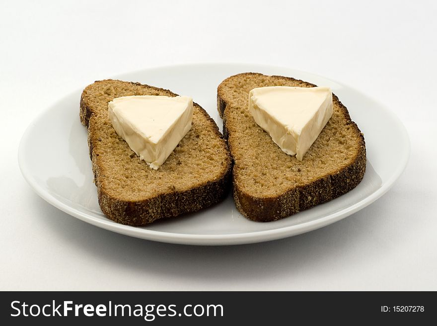 Slices of rye bread with cream cheese. Slices of rye bread with cream cheese