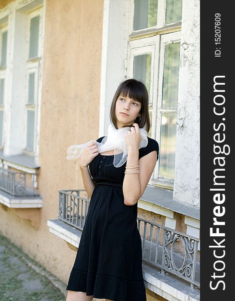 Girl Standing In Front Of A House