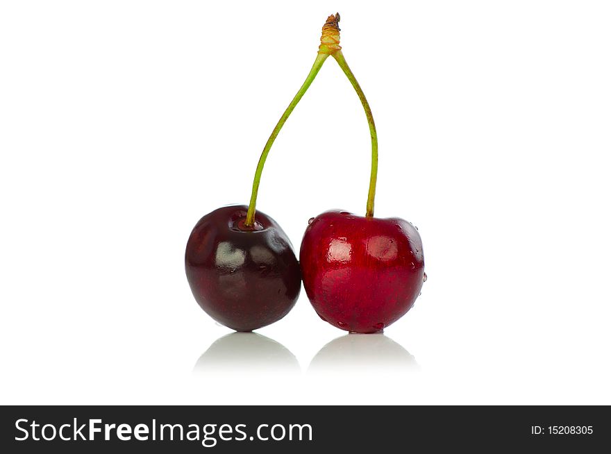 Cherry on white reflective background. Cherry on white reflective background