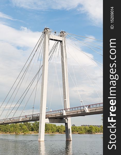 Bridge through river on background cloud