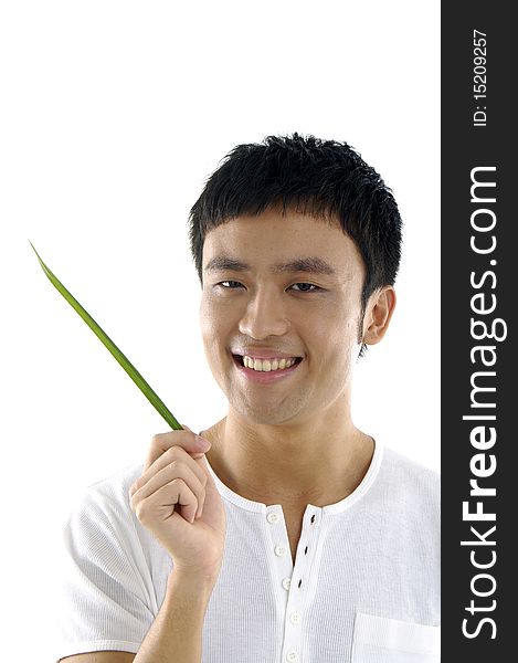 Young man hand holding a green leaf