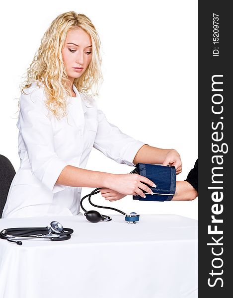 Young woman doctor preparing to take blood pressure. Young woman doctor preparing to take blood pressure