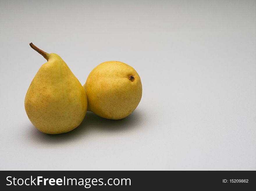 Two Yellow Pears, isolated on white background.