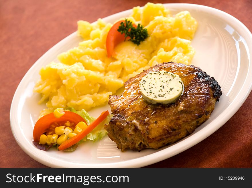 Juicy steak of pork,grilled-with salad of potatoes