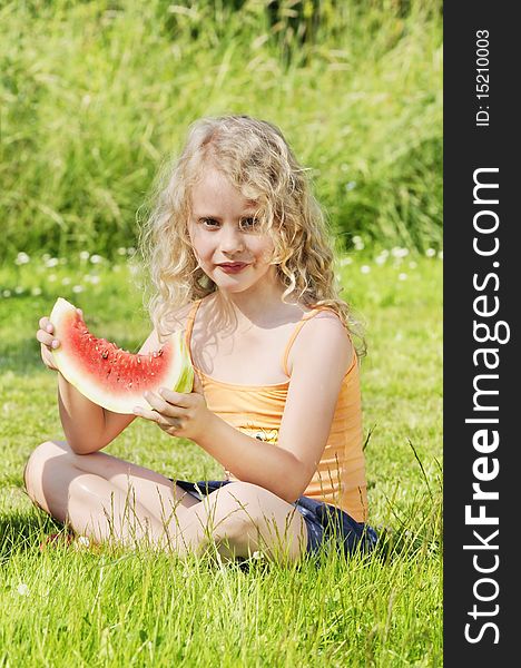 Girl eating water-melon