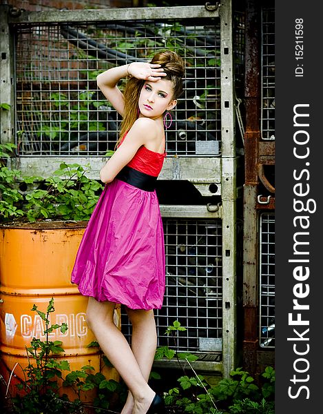 Teenage girl model presenting flashy clothes in old natural background. Teenage girl model presenting flashy clothes in old natural background