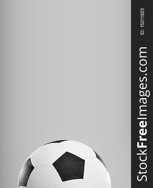 Half of the soccer ball isolated on gray background