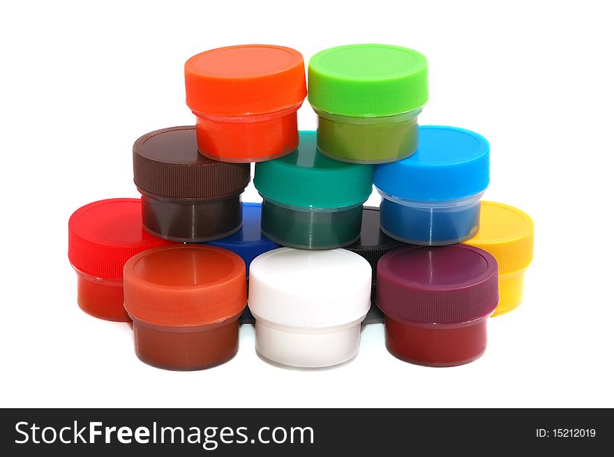 Multicolored paints on the white background
