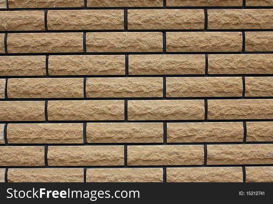The wall of brown brick